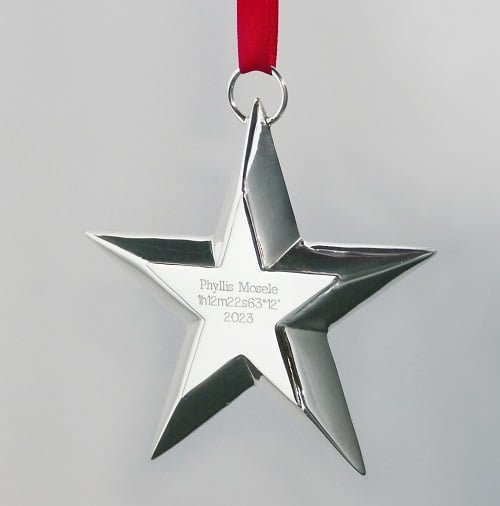 Sterling silver Christmas ornament with the custom star coordinates engraved.