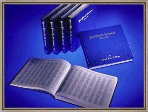 6 volumes of "Your Place in the Cosmos" on a blue background. one volume is open to display the star names.