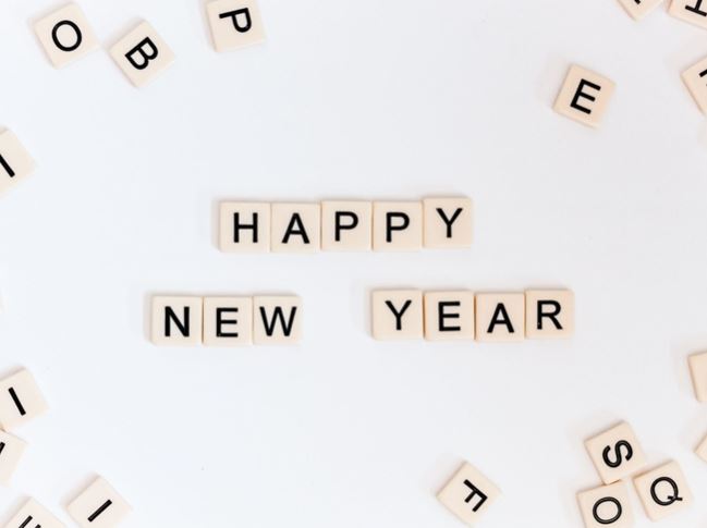 Happy New Year spelled out in Scrabble letters