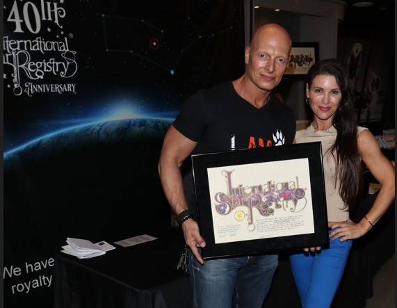 Joe Gatt holding his name a star certificate from starregistry.com