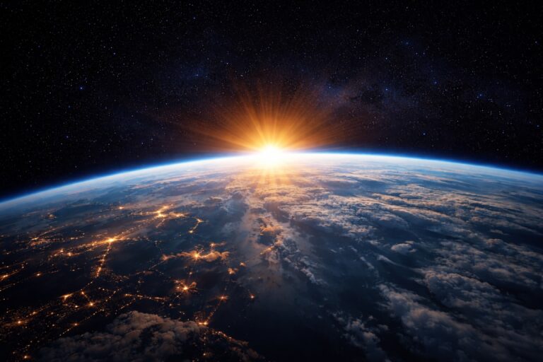 The sun rises over the Earth as seen from space